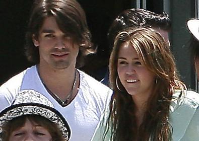 Justin Gaston and Miley Cyrus